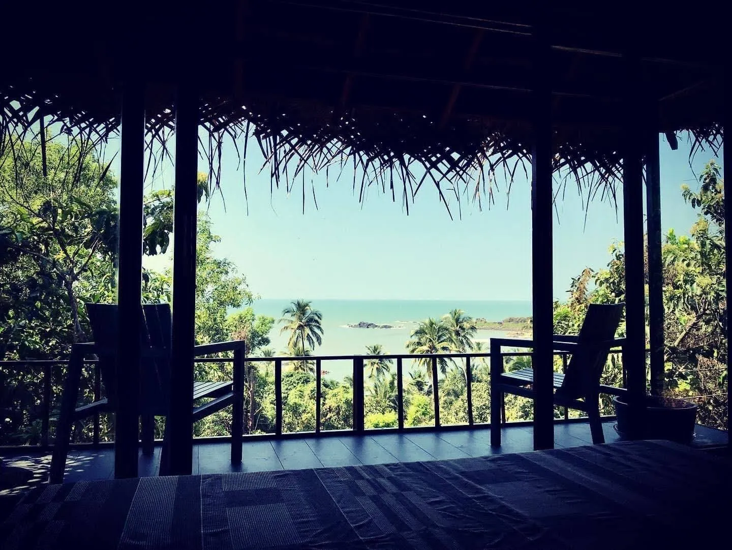 Relaxing on a private balcony overlooking the Arabian Sea at Turtle Hill